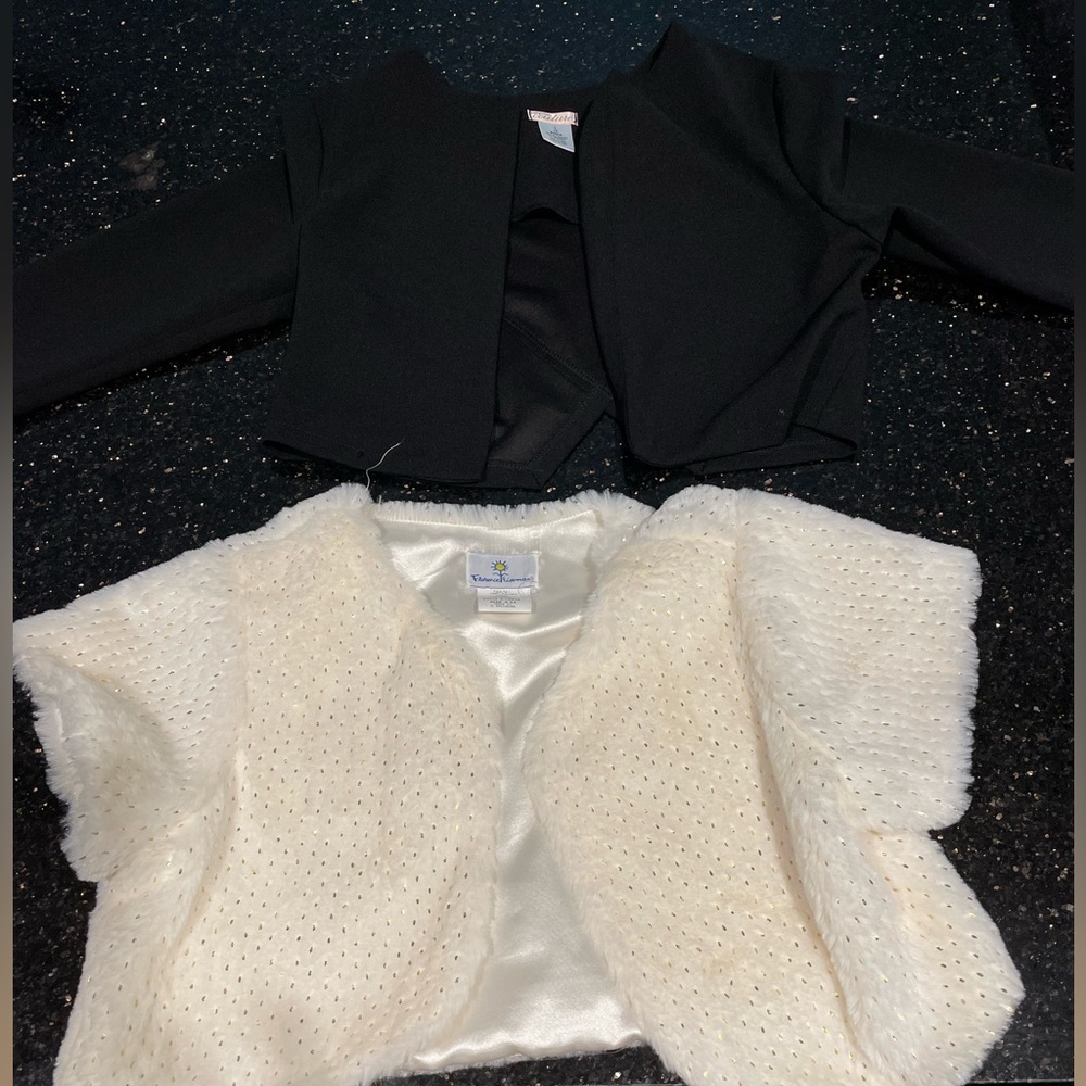 Two cute ‘fancy’ shrugs for dresses.  Black and white with gold specked.